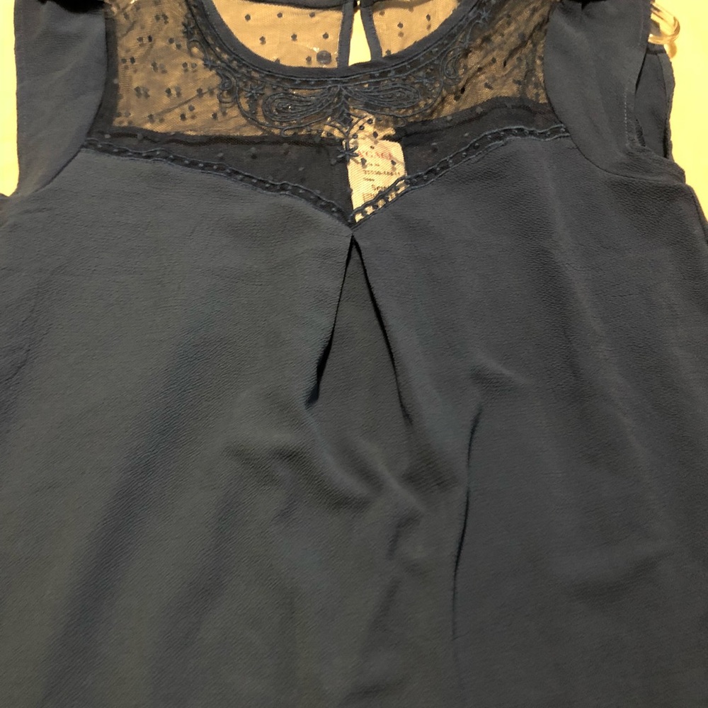 Blue shirt with clear chest part.